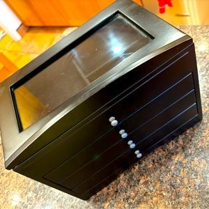 Jewelry Box with 4 drawers. Black. Slightly used. Great condition.